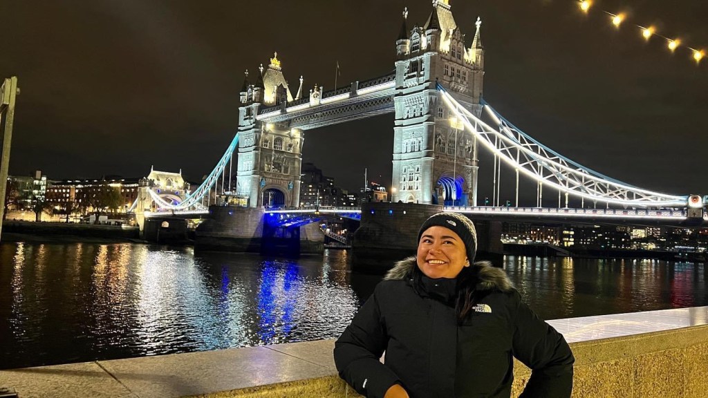 Paula Avila standing at the London Bridge. 